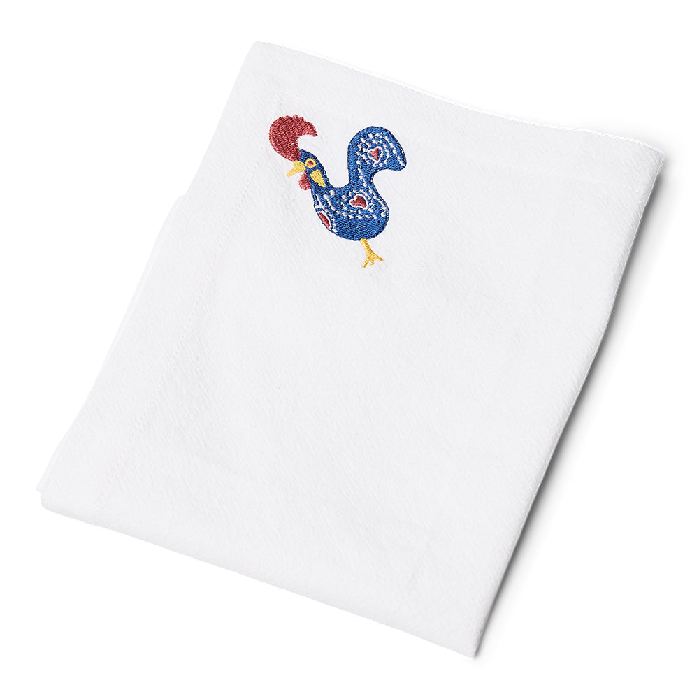 Servett med broderad tupp