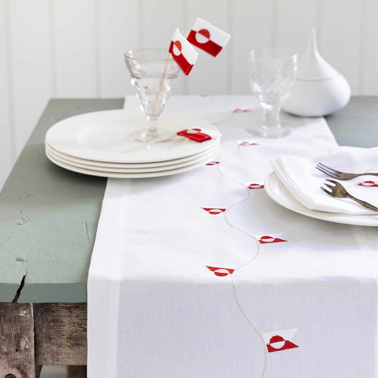 Bordslöpare med grönländsk flagga