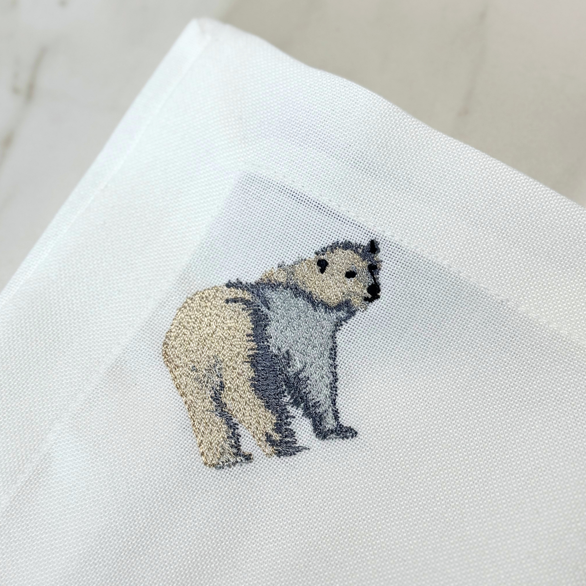 Tygservett med broderad isbjörn – 2-pack