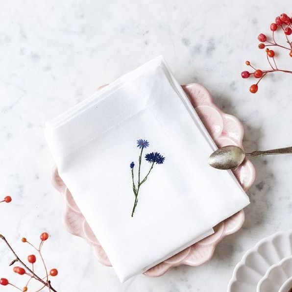 Flora tygservett med blåklint